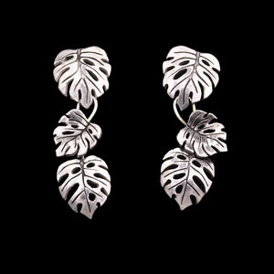 Sterling Silver leaf-shaped earrings. Each earring is composed from 3 monstera leaves.
