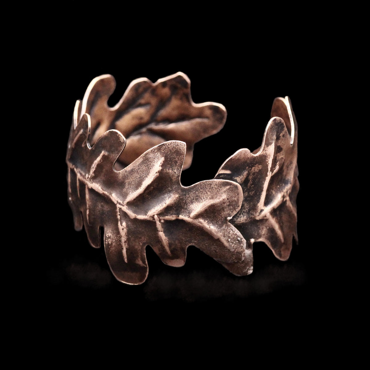 Handmade oak leaf cuff bracelet in recycled copper with a warm patina