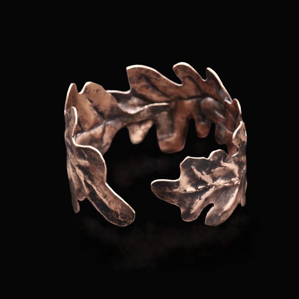Handmade oak leaf cuff bracelet in recycled copper with a warm patina
