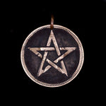 Copper Penny coin pendant engraved with star on dark background, modern interpretation of trench art, Ade by Thornhill Jewellery